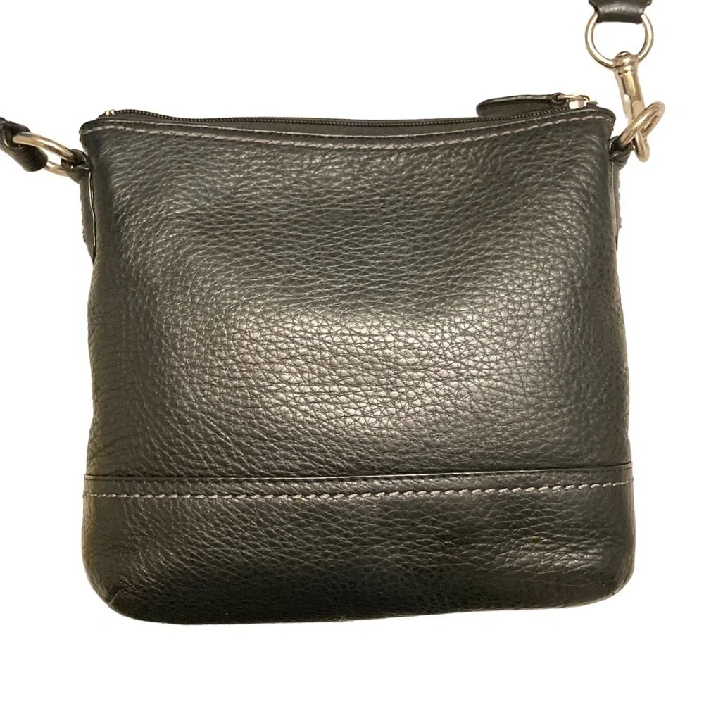 Coach black pebbled leather turnlock swingpack crossbody bag